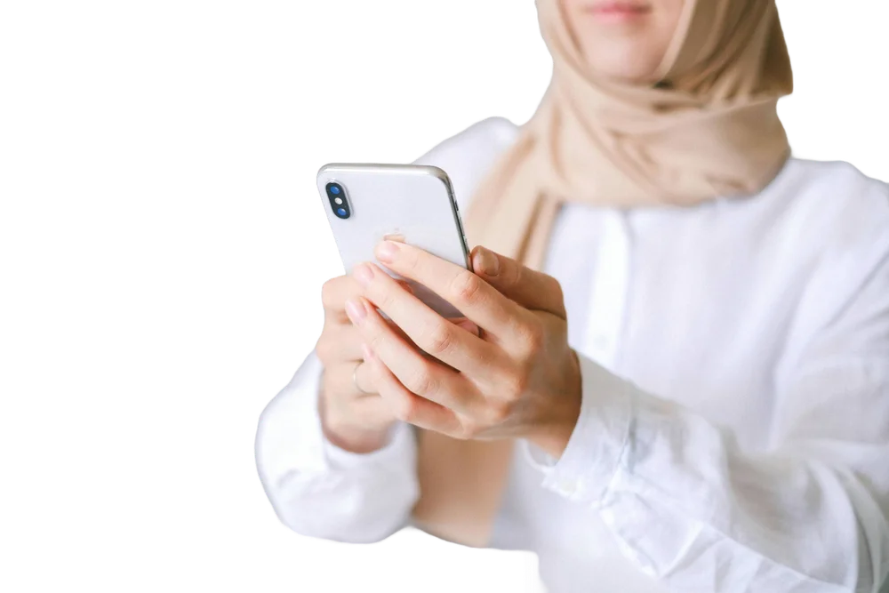 A traveler activating an eSIM on a smartphone